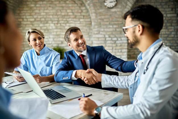 two men shaking hand for business deal