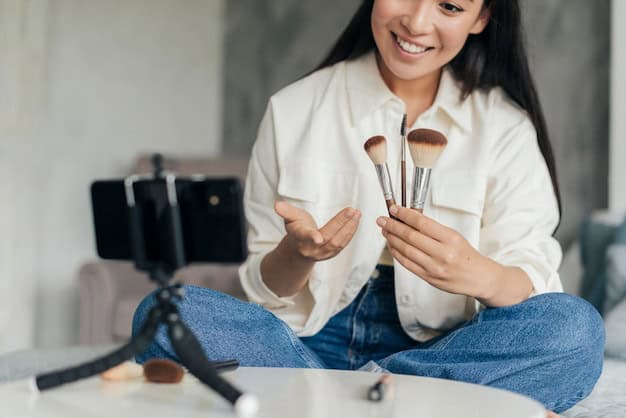 Influencer woman holding make up brushes while vlogging for instagram growth